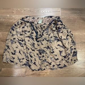 Modbe tan skirt with navy blue birds, size Xl